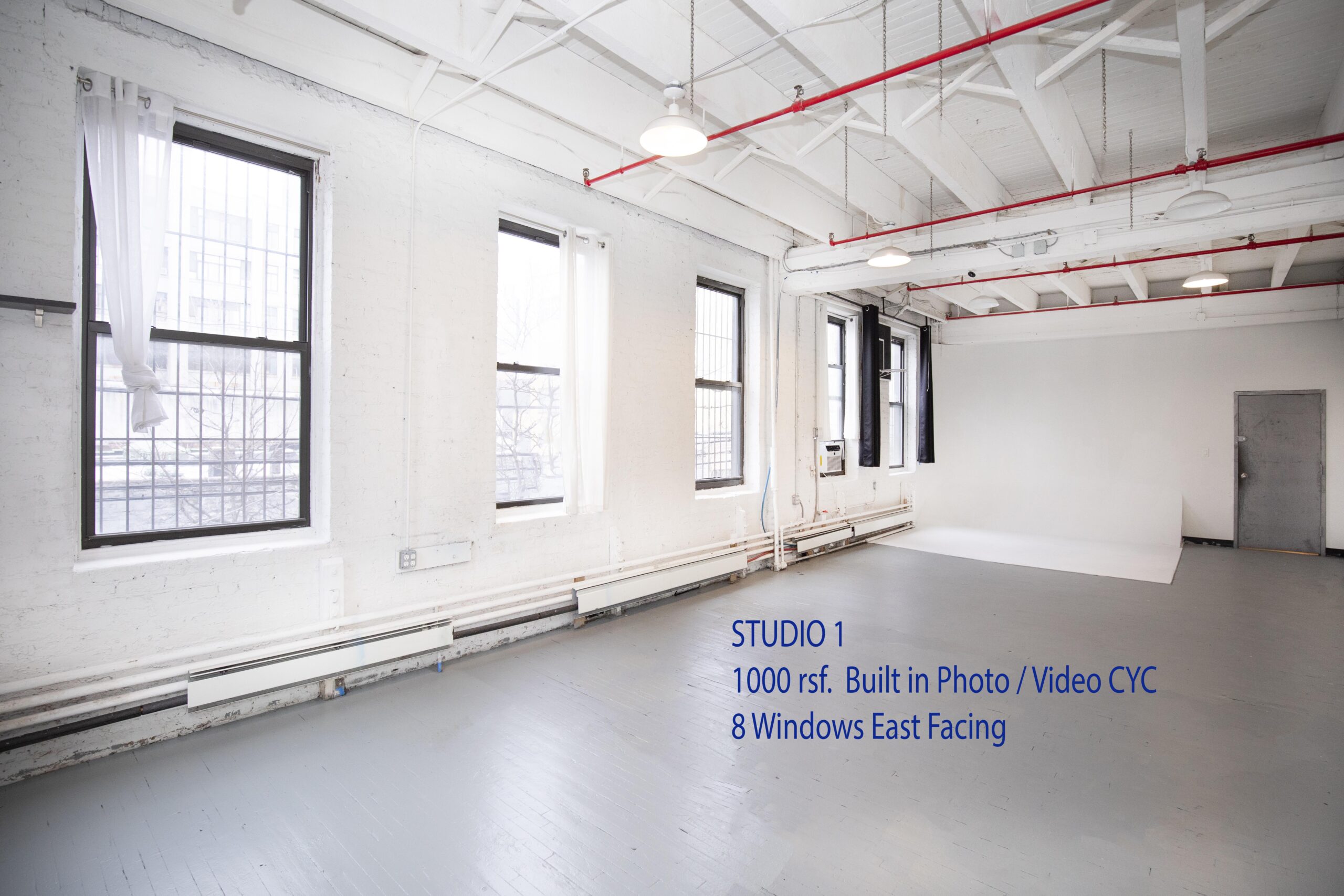 Large Loft Office/Showroom/Studio with Photo CYC, 7 East and North Facing Windows - All Utilities Included. FIOS WIFI.