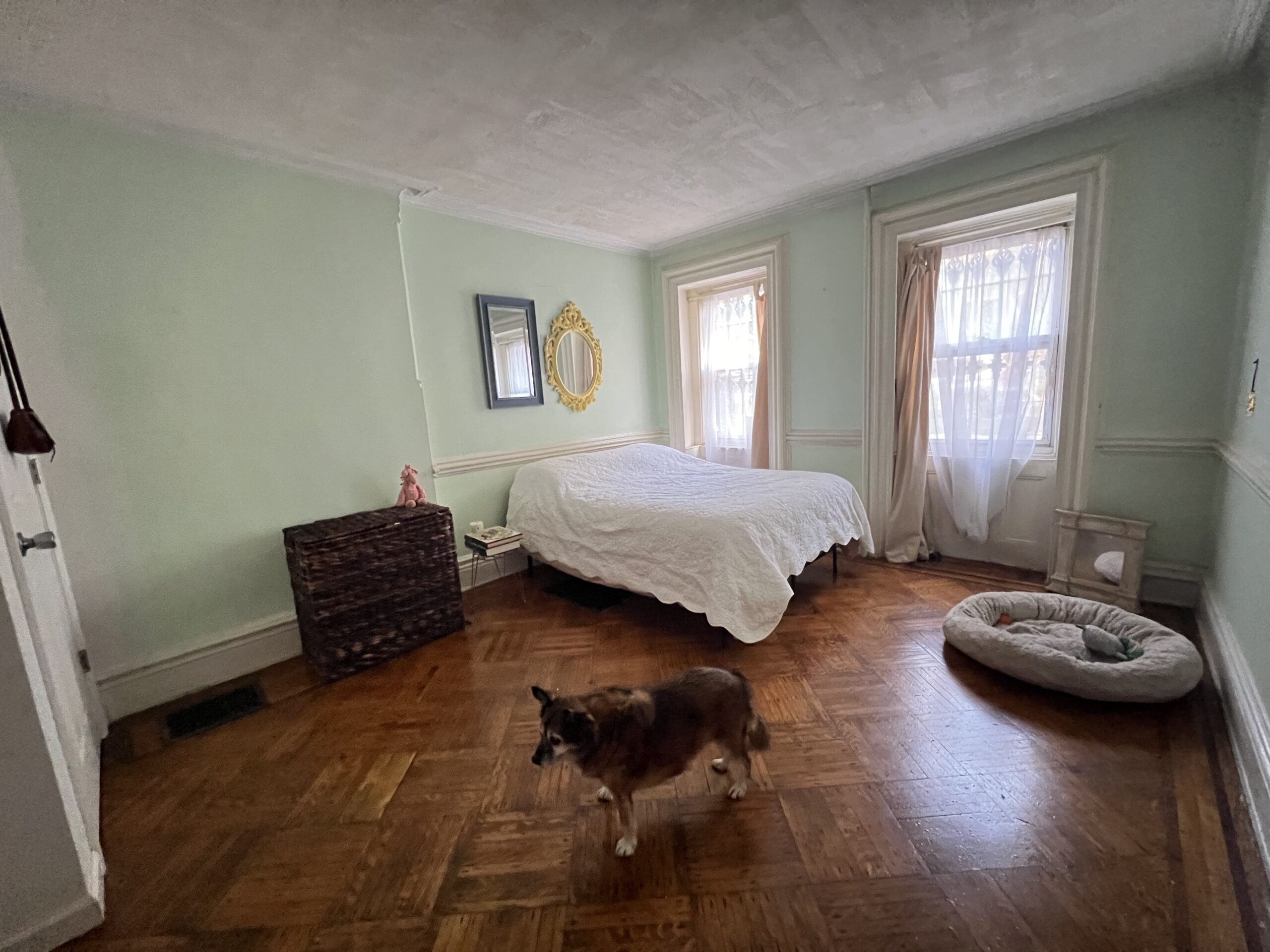 railroad style, ground floor apartment with private backyard