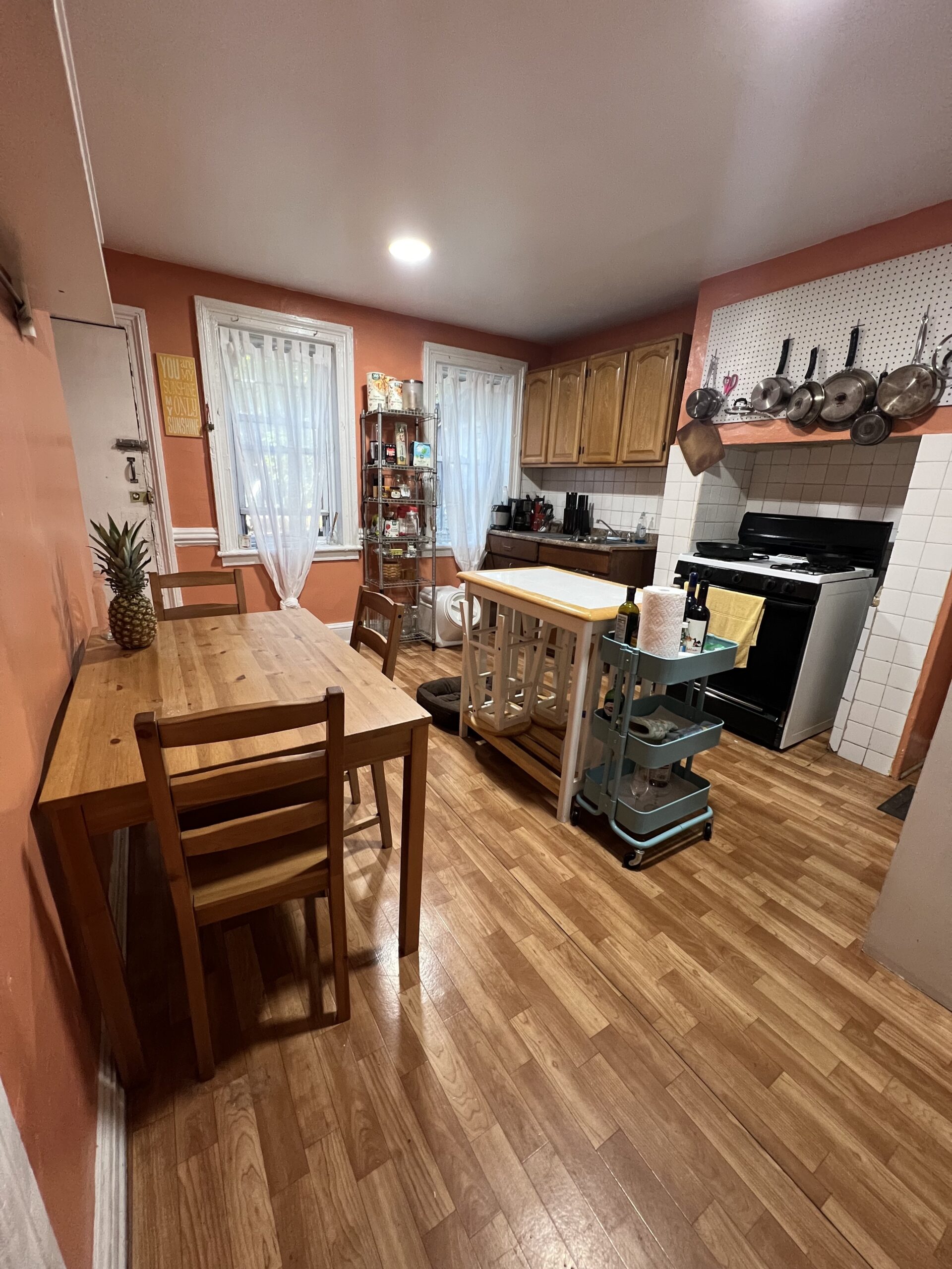 railroad style, ground floor apartment with private backyard
