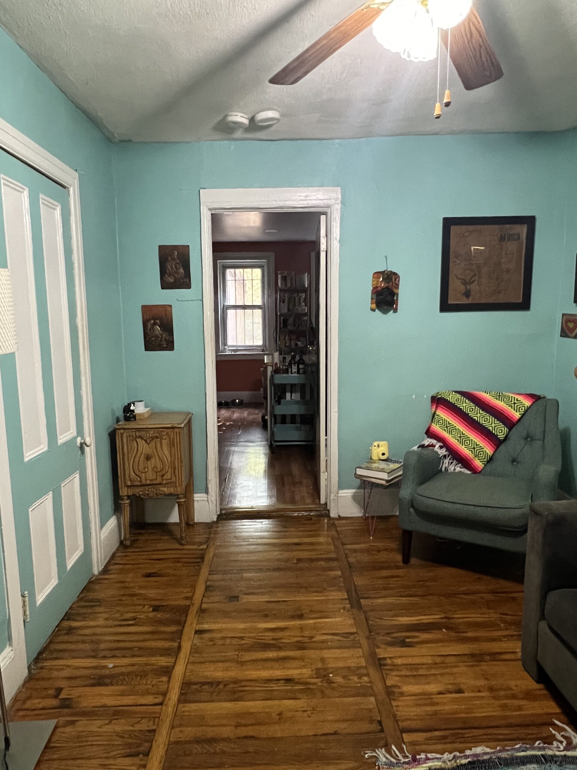 railroad style, ground floor apartment with private backyard