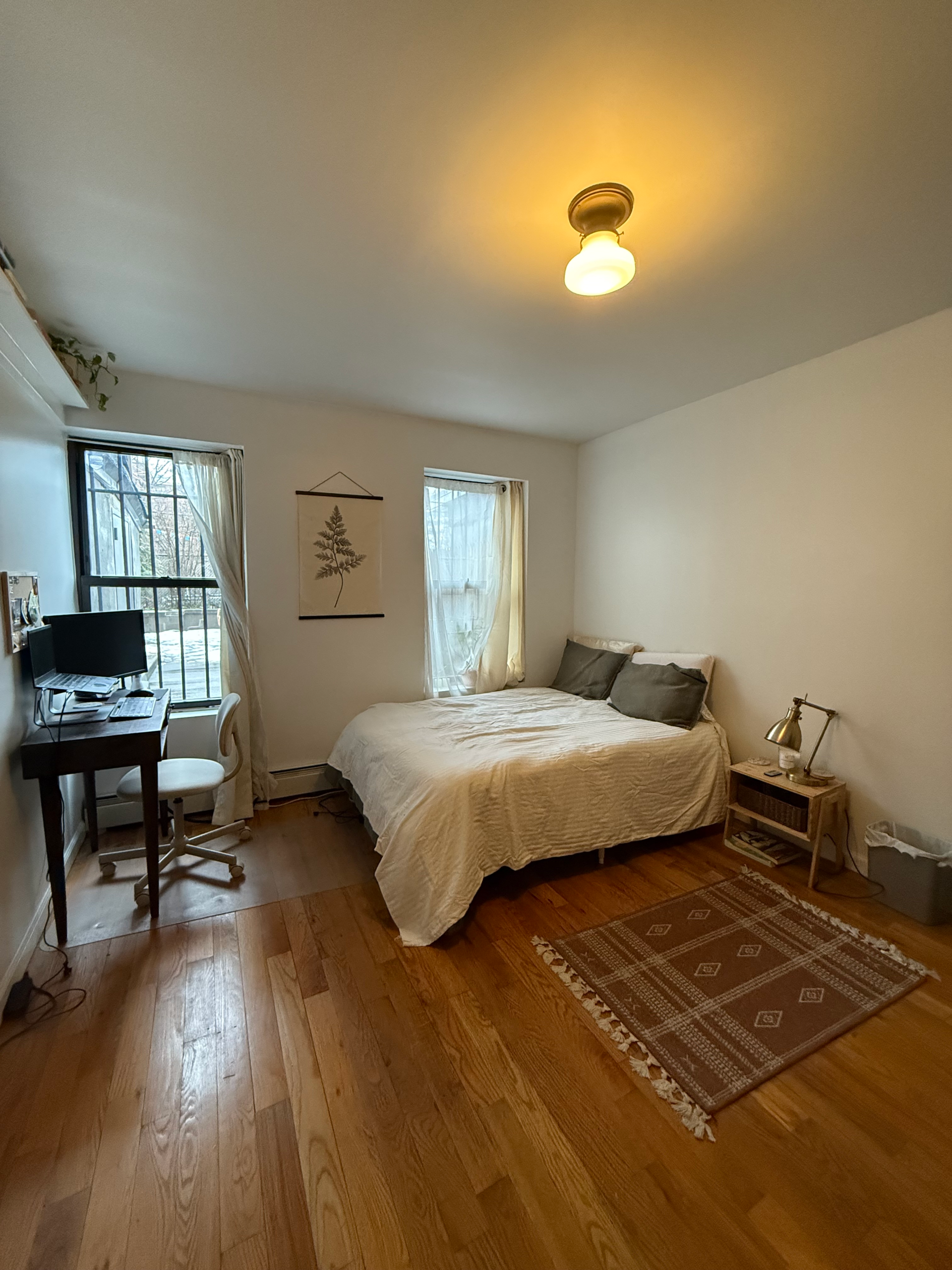 Spacious bedroom in a 2 bed apartment with a sunny backyard