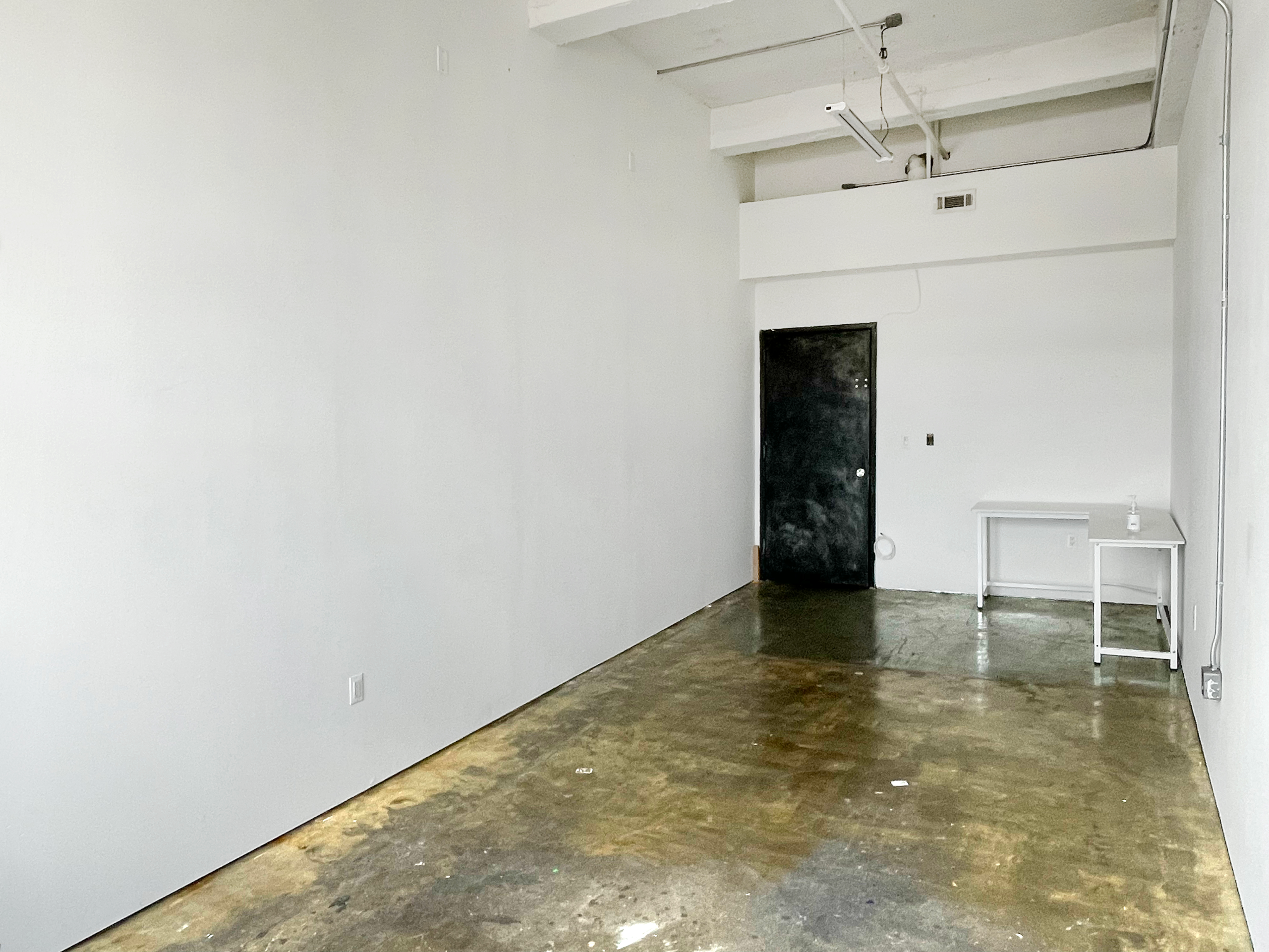 STUDIO 214: RIDGEWOOD ART STUDIO W BRICK WALL & INDUSTRIAL WINDOW