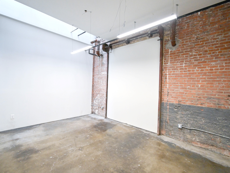 STUDIO 183: SUNLIT CREATIVE STUDIO W INDUSTRIAL BRICK FEATURE WALL